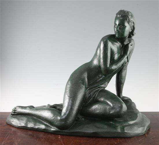 Cipriani. A green patinated terracotta figure of a kneeling woman(-)